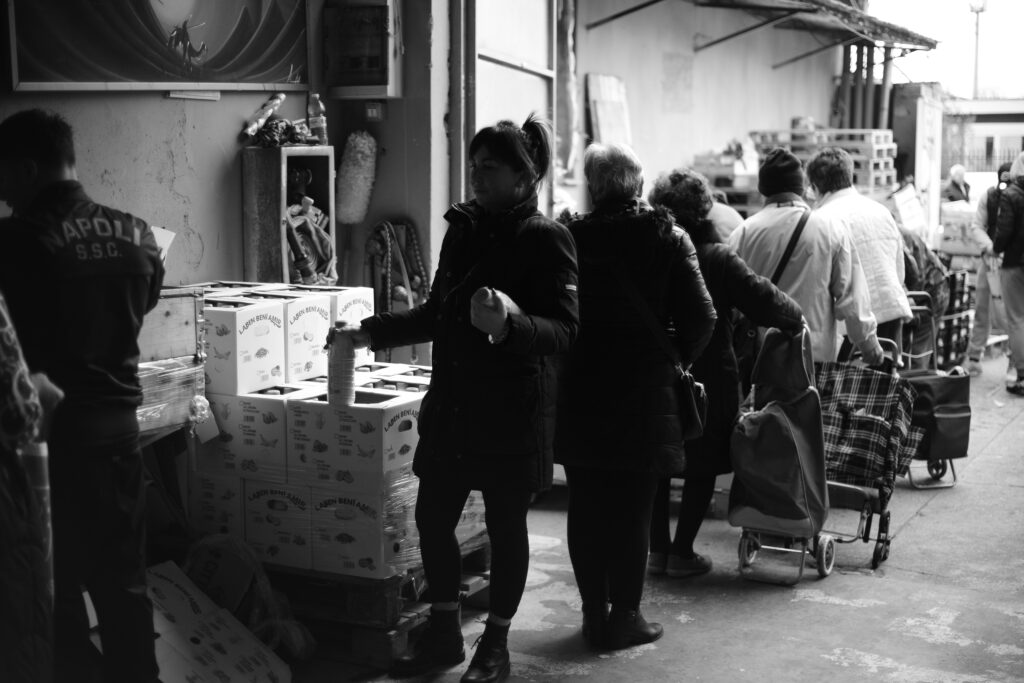 black and white picture of nonprofit workers working with a video production company