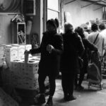 black and white picture of nonprofit workers working with a video production company