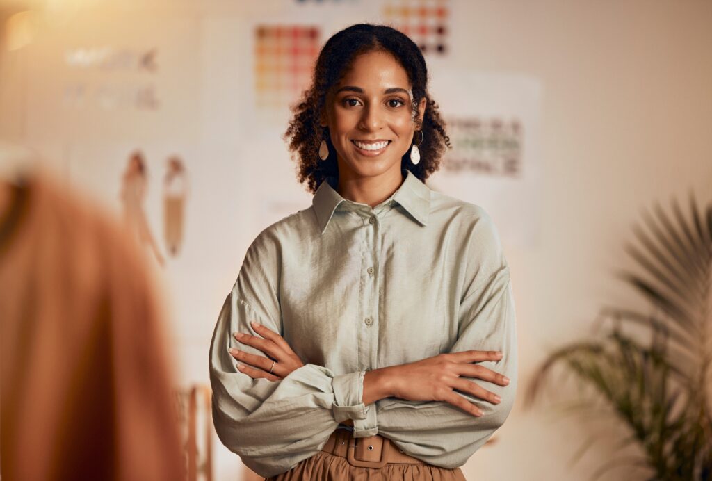 retail owner with cute outfit looking into the camera during her retail video production shoot 